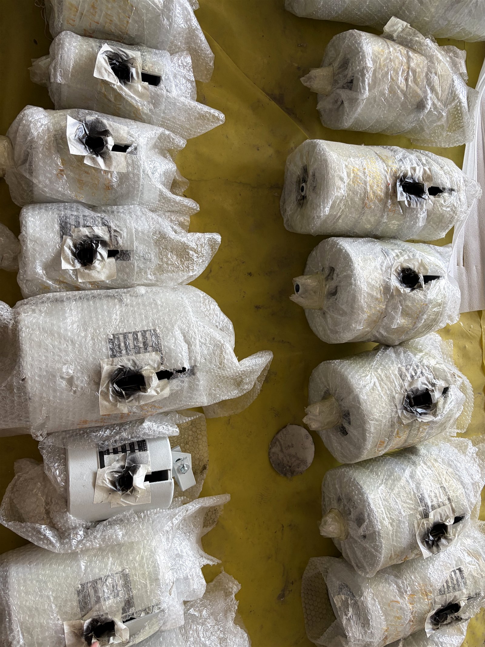 Spring support units individually bubble-wrapped and labelled before crating