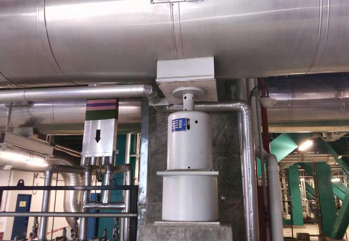 Variable spring support carrying a hot insulated line from below