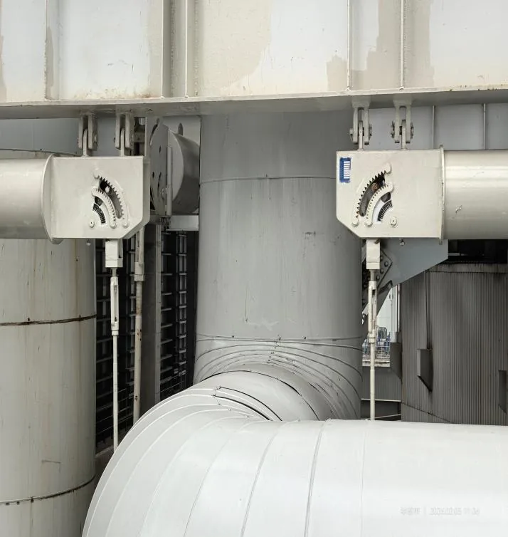 Two constant support units installed above insulated piping at an anonymized power generation facility